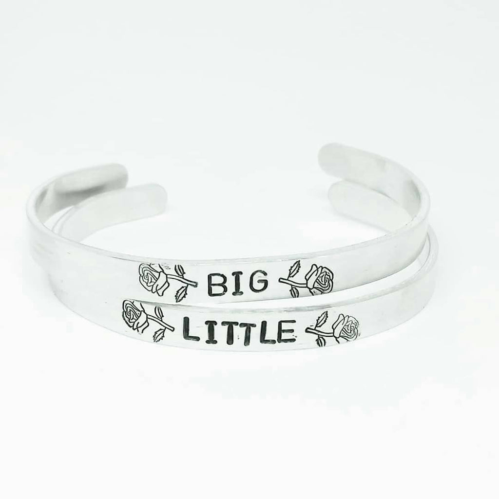 SIA Custom Pulsera