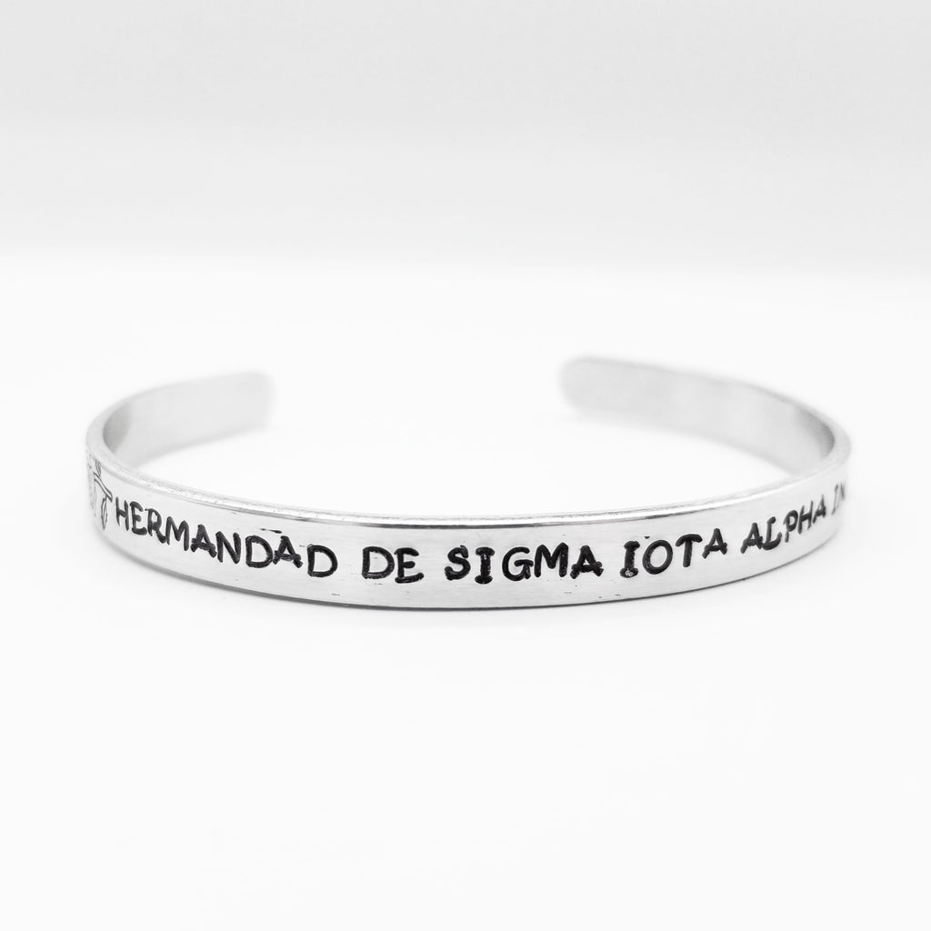 SIA Custom Pulsera