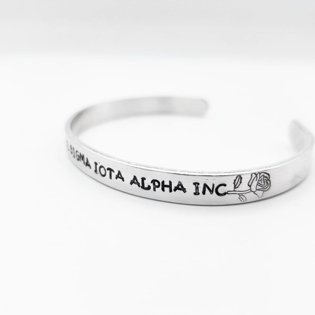 SIA Custom Pulsera