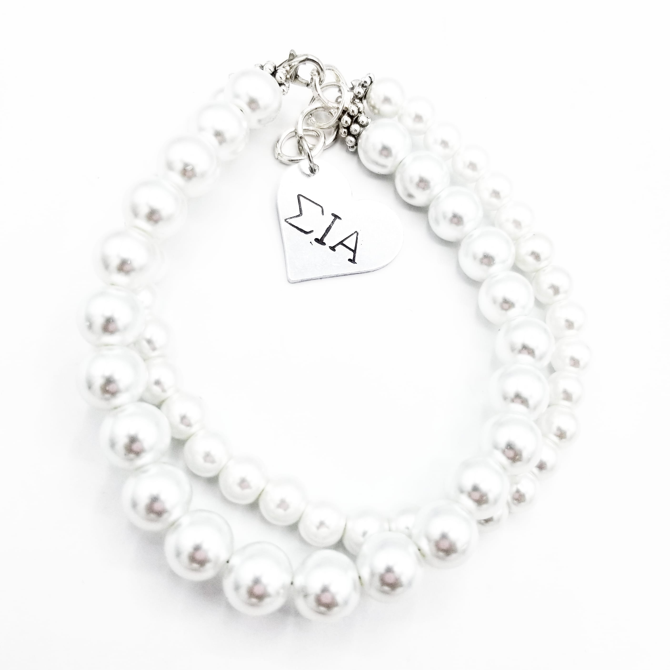 SIA 2 strand Perla Pulsera with 1 charm